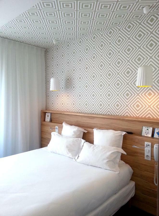 Hotel Et Apparts Marin Laval  Bagian luar foto